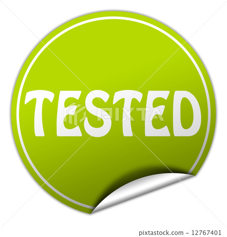 tested round green sticker on white background 12767401
