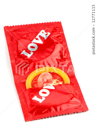 Latex Condom on White Background. 12771115