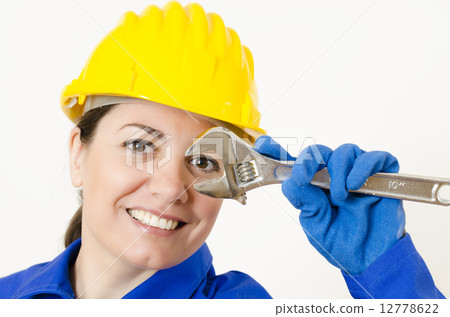 Woman holding Adjustable Wrench Woman holding Adjustable Wrench 12778622