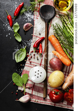 Wooden spoon and ingredients 12778989