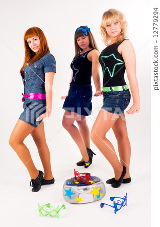 Three pretty girls dancing 12779294