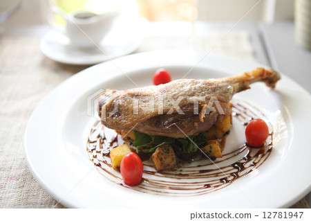 Duck confit , Roasted duck with blueberry sauce 12781947