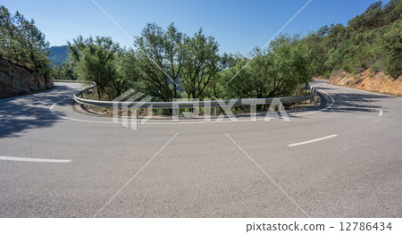 Mountain hairpin bend curved road 12786434
