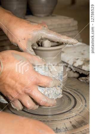 close up photo of hands in potter craft close up photo of hands in potter craft 12786529