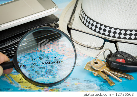 Image of magnifier grass on world map. 12786568