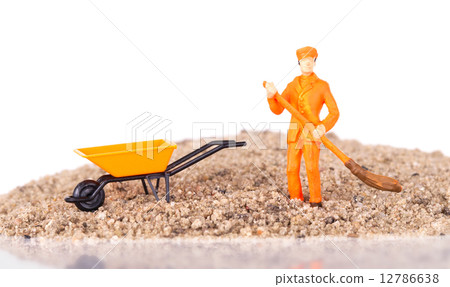 Miniature worker is cleaning a keyboard 12786638