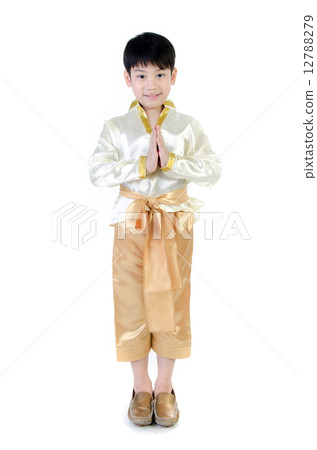 Asian cute boy in thai costume acting Hello in thai on white bac Asian cute boy in thai costume acting Hello in thai on white bac 12788279