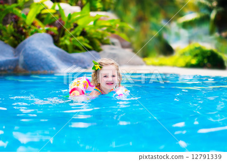 Baby in a swimming pool Baby in a swimming pool 12791339