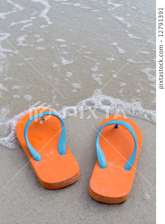 flip-flop on the beach 12791391