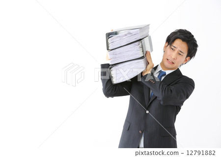 Male businessmen with heavy files 12791882