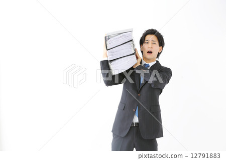 Male businessmen with heavy files Male businessmen with heavy files 12791883