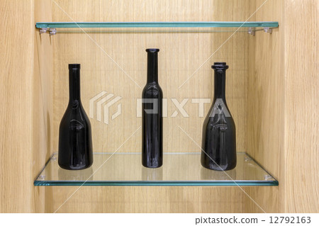 Three Empty black bottles 12792163