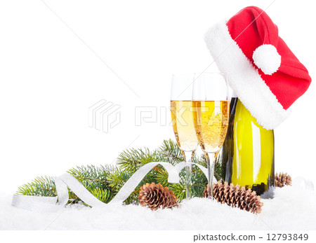 Champagne, christmas decor and santa hat 12793849