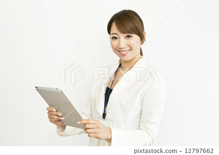 A woman with a tablet 12797662