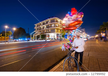 Vendor selling balloons at evening Phnom Penh, Cambodia 12799492