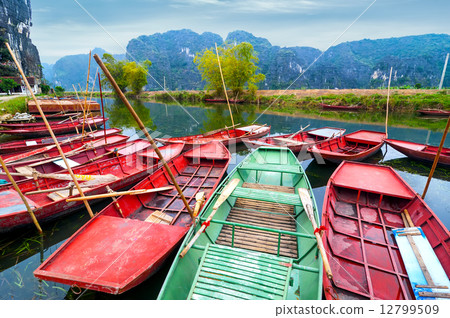 Vietnamese boats at river. Ninh Binh,. Vietnam Vietnamese boats at river. Ninh Binh,. Vietnam 12799509