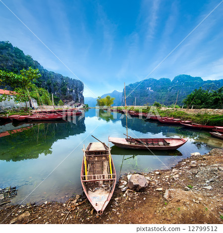 Vietnamese boats at river. Ninh Binh,. Vietnam Vietnamese boats at river. Ninh Binh,. Vietnam 12799512