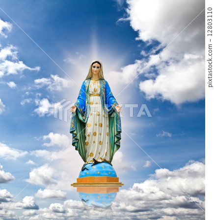 Virgin mary statue at the sky background. 12803110