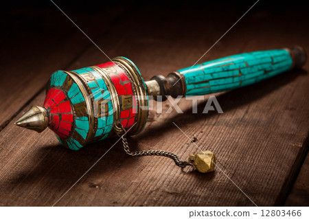 Tibetan buddhist Mani wheel or hand prayer wheel Tibetan buddhist Mani wheel or hand prayer wheel 12803466