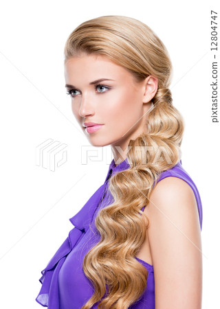 Beautiful blond woman with long curly hair. 12804747
