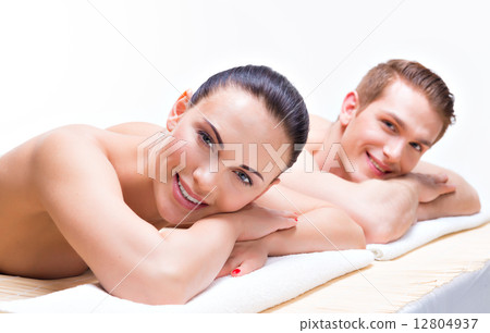 Couple lying on the massage desks. Couple lying on the massage desks. 12804937