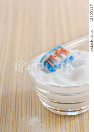 sodium bicarbonate and a toothbrush sodium bicarbonate and a toothbrush 12805137