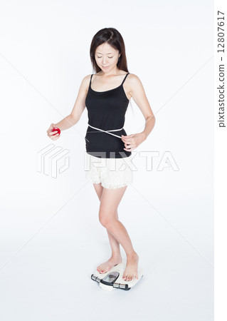 A woman wearing a waist A woman wearing a waist 12807617