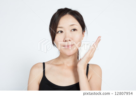 Women with facial cleansing Women with facial cleansing 12807954