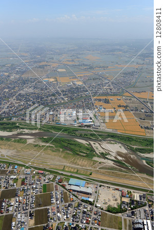 Aerial view of the Hokuriku Shinkansen under construction from over Takaoka City Aerial view of the Hokuriku Shinkansen under construction from over Takaoka City 12808411