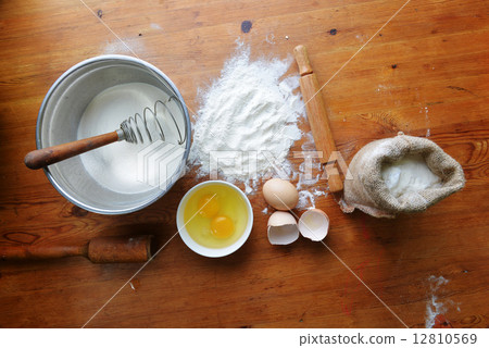 flour on wooden background flour on wooden background 12810569