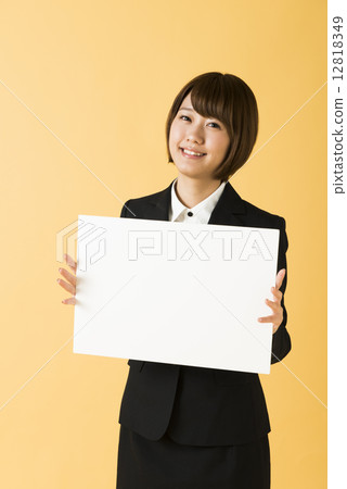 Business woman with message board 12818349