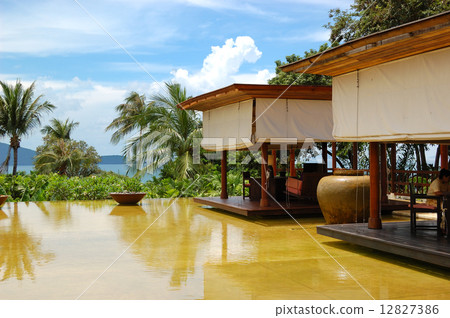 Lounge pool view area at luxury hotel, Phuket, Thailand 12827386