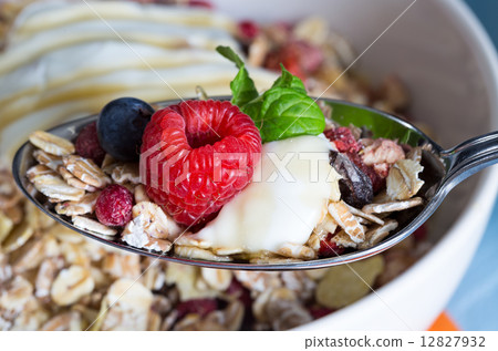 Cereal with yogurt and fruits on wood Cereal with yogurt and fruits on wood 12827932