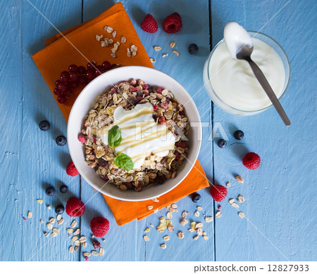 Cereal with yogurt and fruits on wood 12827933