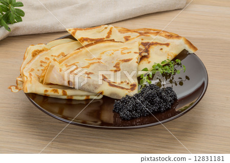 Pancakes with black caviar Pancakes with black caviar 12831181