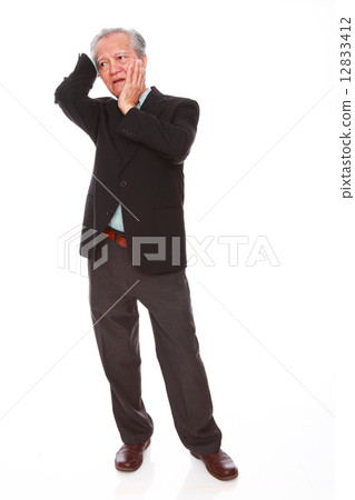 white background,old man, studio shot, businessman portrait suit,senior,formal, serious, confuse     12833412