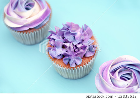 Sweet holiday buffet with vivid cupcakes  12835612