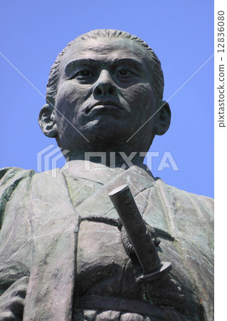 Statue of "Nakaoka Shintaro" standing against the Pacific Ocean at Muroto Cape 12836080