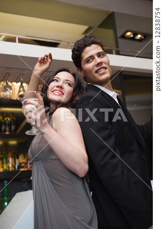 Happy friends dancing and smiling 12838754