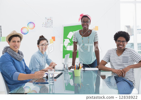 Young creative team having a meeting about recycling Young creative team having a meeting about recycling 12838922