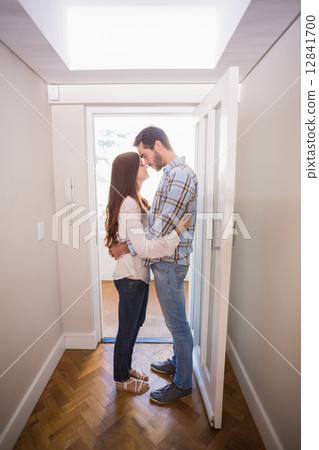 Cute couple standing in the hall Cute couple standing in the hall 12841700