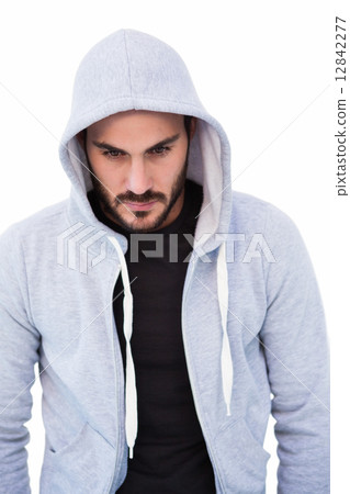 Portrait of dangerous man wearing hooded jacket Portrait of dangerous man wearing hooded jacket 12842277