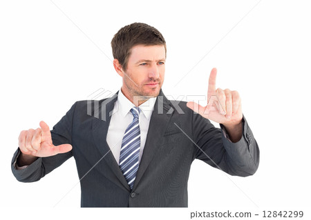 Businessman pointing with his fingers Businessman pointing with his fingers 12842299