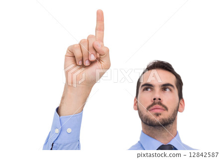 Businessman in shirt pointing something up Businessman in shirt pointing something up 12842587
