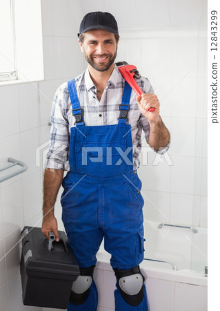 Plumber holding wrench and toolbox 12843299