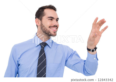 Happy businessman catching something with his hand 12843342