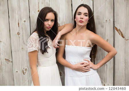 Pretty friends posing in white dresses Pretty friends posing in white dresses 12843460
