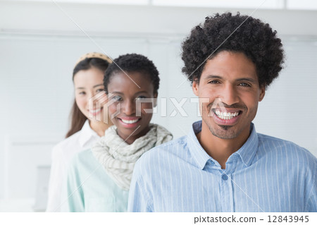 Creative team smiling together Creative team smiling together 12843945