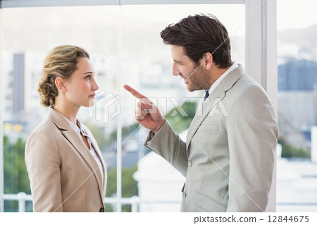 Angry man pointing at his colleague 12844675