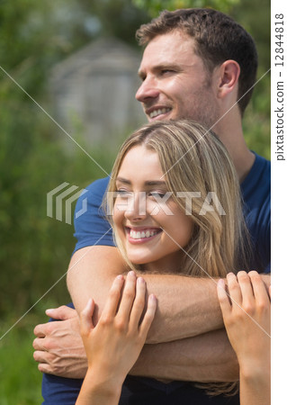 Cute couple smiling and hugging Cute couple smiling and hugging 12844818